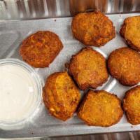 8 Pieces Falafel · Deep-fried vegan fritters are made from ground chickpeas, served with white sauce and chutney.