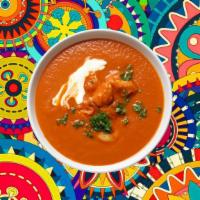 Awadhi Butter Chicken · Tender chunks of char grilled tandoori chicken in a  creamy and deliciously smooth butter, t...