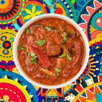 Coastal Lamb Vindaloo · A special from the coastal state of Goa, boneless chunks of lamb, slow cooked in a hot and t...