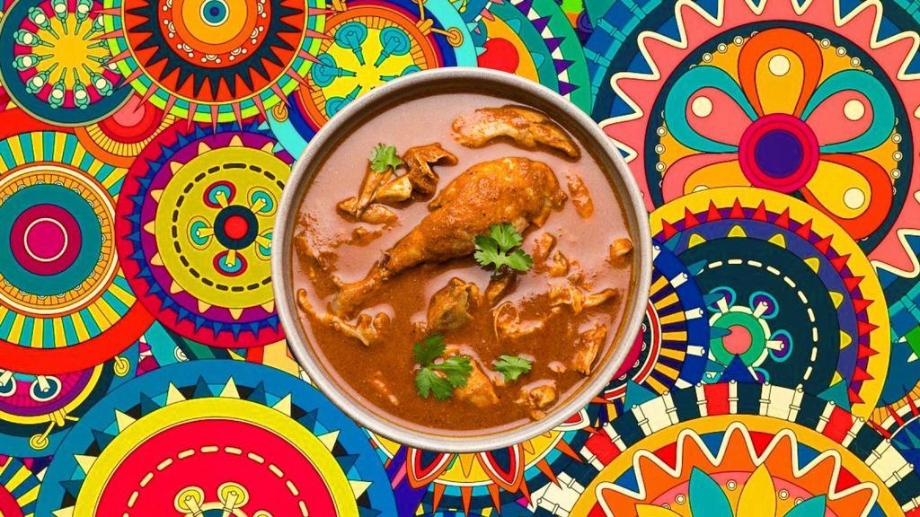 Homestyle Chicken Curry · Tender morsels of chicken cooked in a classic brown curry with Indian whole spices, served with a side of our aromatic basmati rice