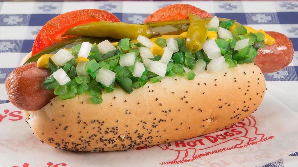 Hot Dog · Chicago-style hot dog with everything, which includes mustard, relish, celery salt, freshly chopped onions, sliced red ripe tomatoes, kosher pickle and sport peppers piled onto a perfectly steamed poppy seed bun. Chicagoans call this “dragging the dog through the garden.