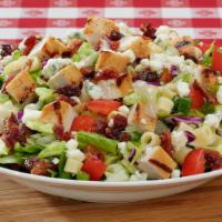 Chopped Salad · Everything includes chopped romaine, iceberg lettuce, & red cabbage with diced chicken breas...