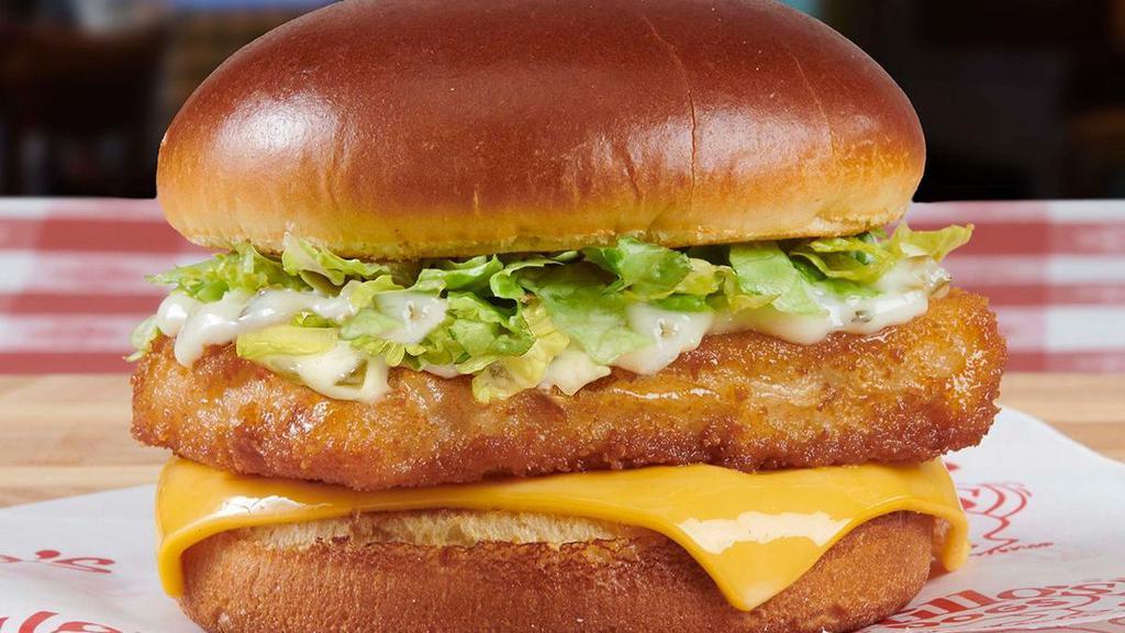 Breaded Whitefish Sandwich · A breaded wild-caught whitefish filet on a brioche bun with American cheese, chopped lettuce, and tartar sauce..