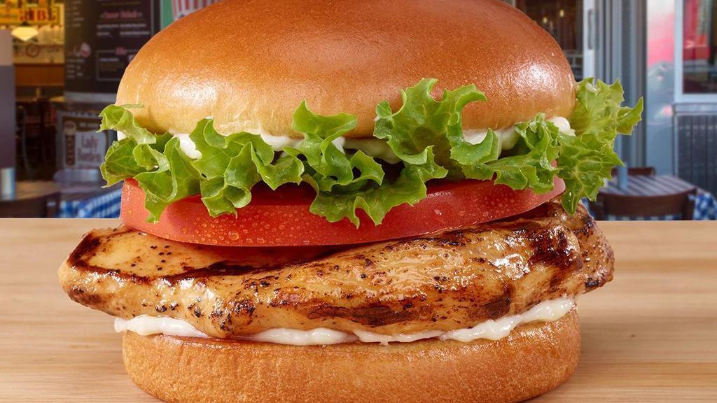 Char-Broiled Chicken Sandwich · A char-broiled chicken breast, seasoned with a blend of secret spices, and served tender and juicy. Topped with mayo, lettuce, and tomato on a toasted brioche bun.