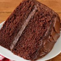 Chocolate Cake Slice · Our famous, homemade, fluffy chocolate cake is baked with love every morning in each restaur...