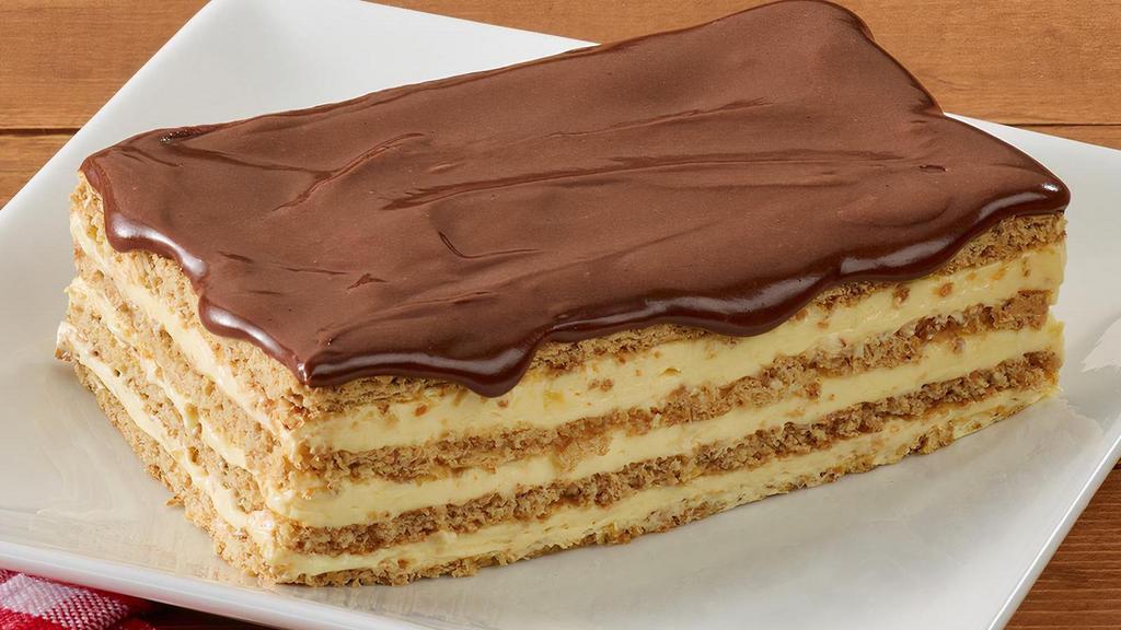 Chocolate Éclair Cake · Our homemade Chocolate Éclair Cake is a seven-layer cake topped with rich chocolate frosting. .