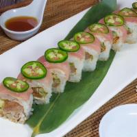 Snow White Roll (Soy Paper Roll) · Spicy albacore and cucumber wrapped with soy paper topped lemon, yellowtail, and jalapeno