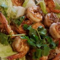 Garlic Pepper Shrimp (House Specialty) · Spicy. Mild spicy. Pan fried shrimp with garlic sauce on a bed of lettuce.