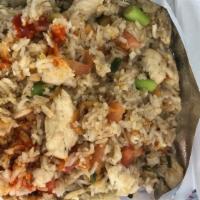 Fried Rice · Fried rice with tomatoes, onions, and egg. Choice of meat or tofu.