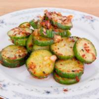 Cucumber Kimchi · Vegan. Fresh cucumbers, red onions, chili flakes.