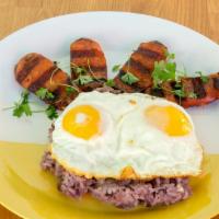 Local Plate · Grilled Portuguese sausage, 2 sunny-side up eggs, purple rice.