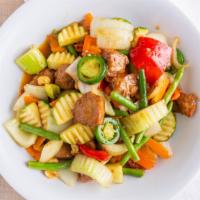 Kung-Pao Vegan Chicken · Spicy vegan chicken sauteed with celery, zucchini,onion,carrot, green bean, peanut, jalapeno.
