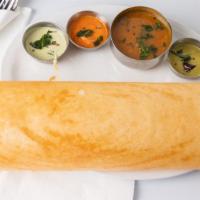 Masala Dosai · Crepe filled with potatoes and onions. Rice and lentil crepe served with sambar a traditiona...