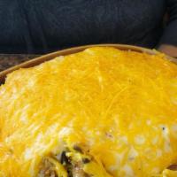 Sausage Skillet · Scrambled eggs with a great combo of bacon, sausage, and mushrooms topped with cheese and sa...