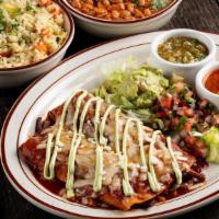 Mexi-Q Enchiladas · Jack cheese, guajillo red chili sauce, avocado crema. Your choice of Barbacoa Brisket, Roast...