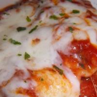 Lasagna Classico · Layers of pasta, meat sauce, ricotta, mozzarella, and Romano cheeses.
