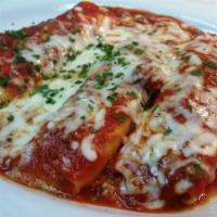 Manicotti · Baked with meat sauce or marinara sauce and mozzarella cheese.