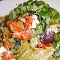 Mediterranean Pasta · Spinach linguini tossed with garlic, olive oil, diced tomatoes, feta cheese, and kalamata ol...
