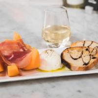 Burrata Melon & Prosciutto · Burrata, melon, prosciutto and extra virgin olive olive.