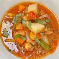Minestrone Soup · Italian crushed tomatoes, onion, spinach, garbanzo beans, carrots, celery, potatoes, green b...