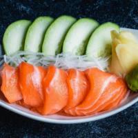 Salmon Sashimi (5Pc) · Sashimi Grade Sliced Raw Salmon. Serves with Wasabi, Ginger, Soy Sauce.