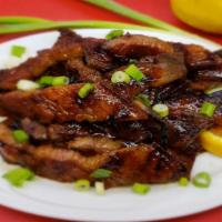 Pork Liempo · Our very BEST grilled pork belly marinated with special sauce.