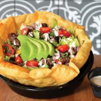 Taco Salad · Shredded lettuce, mixed cheese, pico de gallo, refried beans, avocado, red onions, jalapeño,...