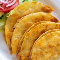 Tacos Gobernador · Four crispy, flavor packed tacos! Sautéed shrimp, tomato, onion, and cilantro in a cheesy to...