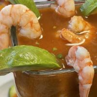Cóctel De Camarón · Fresh and flavorful! Shrimp packed cocktail with tomato, onion, cucumber and cilantro! Garni...