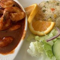 Camarones A La Diabla · Fiery-hot, pan-seared shrimp in our red chile salsa! Served with a side of fresh salad, rice...