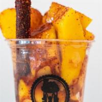 Mangonada · Tamarind stick and mango pieces mixed with sweet and sour chamoy and chili.