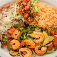 Shrimp Fajitas · Shrimp sauteed with bell peppers, onions and tomatoes in our zesty sauce served with rice an...