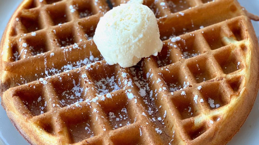 Classic Belgian Waffle · A traditional golden plain Belgian waffle served with butter and hot maple syrup.