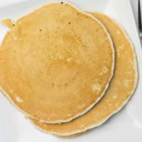 Original Buttermilk Pancakes · Four buttermilk pancakes.