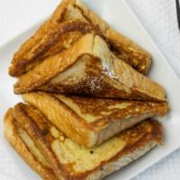 French Toast · Six triangles dusted with powdered sugar.