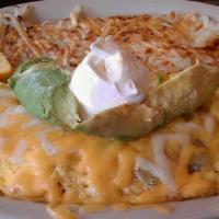 California Omelet · Bacon, tomatoes, ripe olives, cheddar and jack cheese, topped with sour cream and fresh avoc...