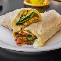 Breakfast Burrito · Large tortilla stuffed with scrambled eggs, bacon, shredded cheese, mixed greens, and tomato...