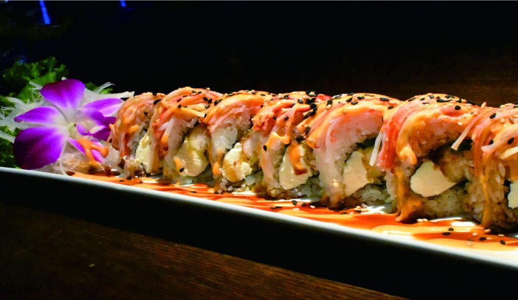 Shaggy Dog Roll · Shrimp Tempura,  cream cheese, and jalapeno topped with crab stick , eel sauce and spicy mayo
