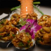 Banzai Roll · Sauteed lobster tail and crab stick in house made special sauce, served with eel sauce, gree...