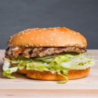 Hamburger (1/4Lb) · Toasted burger bun with an all-beef patty, lettuce, tomato, pickles, red relish, and 1000 is...