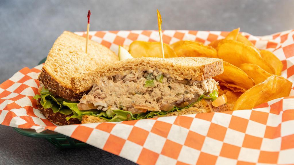 Tuna Salad Sandwich · Classic tuna salad made fresh and served on fresh baked hoagie roll or Wheat bread with lettuce, tomato, and red onion.
