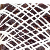 Raspberry Brownie · Our chocolate brownie has semi-sweet chocolate chips baked in and then it’s topped with a yu...