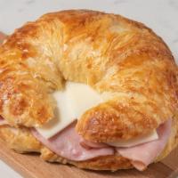 Ham & Cheese Croissant · Our signature ham and cheese melted inside a freshly baked butter croissant. A perfectly del...