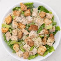 Caesar Chicken Salad · Lettuce,  Italian marinated chicken breast, parmesan cheese, topped with our home-made herbe...