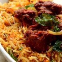 Vijayawada Chicken Biryani · Aromatic Basmati rice made with Indian herbs served over Boneless chicken pieces cooked with...