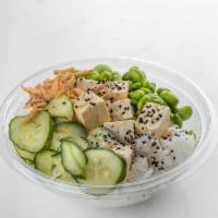 Baked Tofu Bowl · Vegan. Rice, baked tofu, hi poke sauce, Teriyaki sauce, cucumber salad, edamame, sesame seed...
