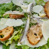 Little Gem Caesar Salad · Little gem lettuce, parmigiano reggiano, Spanish anchovies, and cruton