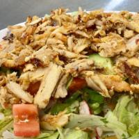 Chicken Gyro Salad · Chopped lettuce, tomatoes, onions topped with marinated chicken shawarma, and creamy house d...