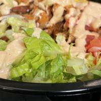 *Burrito Bowl · Your choice of protein, on a bed of rice & beans. topped with lettuce and your choice of sal...