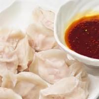 Pork Dumpling In Chili Oil · Eight pieces. Spicy.钟水饺